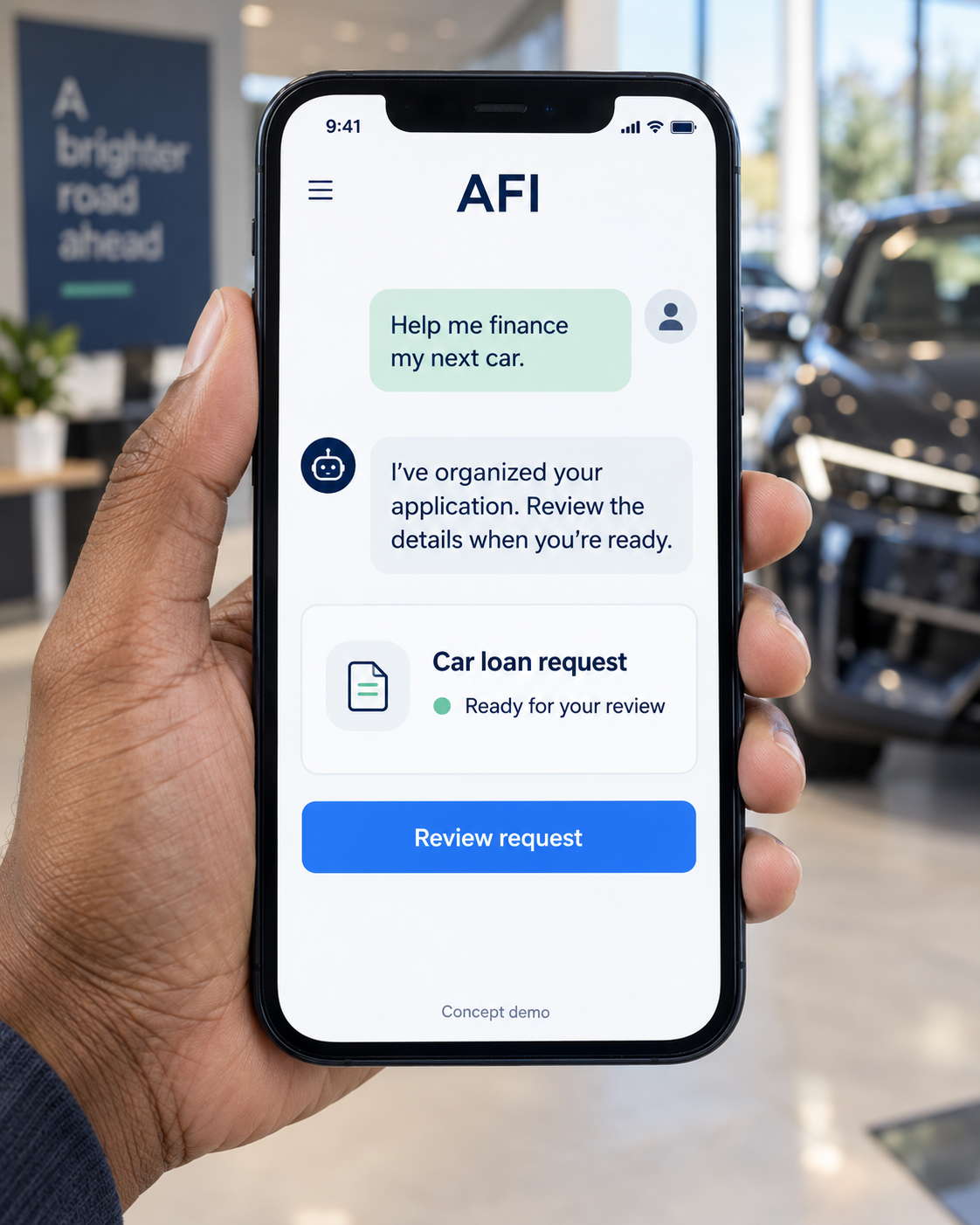 A hand holding a phone with an AFI agent preparing a car loan request for review